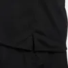 A close-up view of the hem of a black t-shirt, showing the side slit detail. Podgląd zdjęcia produktu
