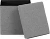 A grey storage ottoman with its lid open, showing the interior. Náhled obrázku produktu