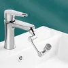 A chrome faucet with an extendable nozzle is shown installed on a white sink. Náhled obrázku produktu