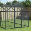 An empty greenhouse structure in a grassy yard with a wooden fence in the background. Náhľad obrázku produktu
