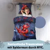A young boy is sleeping in a bed with Spiderman-themed bedding. Produktbild-Vorschau