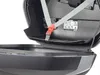 Close-up view of the inside of an open motorcycle top case, showing a strap and some warning labels. Produktbild-Vorschau