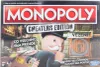 The image shows the front of a Monopoly Cheaters Edition board game box. Náhled obrázku produktu