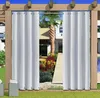 Outdoor curtains hanging on a pergola, with a backyard scene visible through them. Produktbild-Vorschau