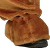 A close-up view of the lower leg and foot area of a costume, showing furry brown material covering the leg and extending over a black shoe. Anteprima dell’immagine prodotto