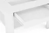 A close-up view of a white furniture drawer that is partially open. Produktbild-Vorschau