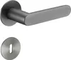 A door handle set with a keyhole escutcheon on a white background. Produktbild-Vorschau