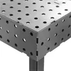 A close-up view of the corner of a metal welding table with a grid of holes. Náhľad obrázku produktu