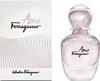 A product shot of a perfume bottle and its packaging. Produktbild-Vorschau