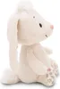 A plush toy rabbit sitting on a white background. Produktbild-Vorschau