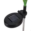 A close-up view of the solar panel and stem of a solar-powered garden light. Anteprima dell’immagine prodotto