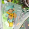 A close-up view of a Minecraft action figure in its packaging. Náhľad obrázku produktu