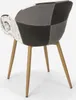 A patchwork chair with wooden legs on a white background. Voir les images du produit