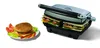 A panini press with two sandwiches inside, and a separate plate with a hamburger and salad. Produktbild-Vorschau