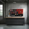 A workshop with a workbench and a pegboard organizer filled with tools and storage bins. Produktbild-Vorschau