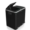 A black dual-compartment trash can with silver pedal levers and trim, shown from a slightly elevated diagonal angle against a white background. Produktbild-Vorschau