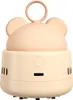 A cute, peach-colored mini desktop vacuum cleaner shaped like a cartoon mouse. Náhled obrázku produktu