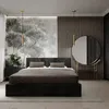 A modern bedroom with a large bed, a dresser, and a vanity with a mirror. Produktbild-Vorschau
