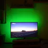 A television set with LED strip lights illuminating the wall behind it. Anteprima dell’immagine prodotto