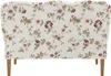 The back of a floral patterned sofa. Produktbild-Vorschau