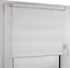 A white zebra roller blind installed on a window frame. Produktbild-Vorschau