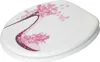 A toilet seat lid with a floral design. Náhled obrázku produktu
