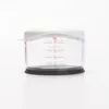A clear studio shot of a manual food chopper on a white background. Produktbild-Vorschau