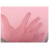 A close-up view of a pink mesh fabric with a hand visible through it. Produktbild-Vorschau