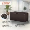 A brown storage box with a wicker-like texture is shown in a modern interior setting with large windows and plants. Anteprima dell’immagine prodotto