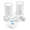 Two white cylindrical mesh Wi-Fi routers are displayed with their accessories, including power adapters and Ethernet cables, arranged on a white surface. Produktbild-Vorschau