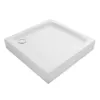 A white square shower tray with a silver drain is shown from a slightly elevated angle against a white background. Produktbild-Vorschau