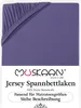 A close-up view of a purple fitted sheet with elastic edging. Produktbild-Vorschau
