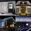 A collage of four images showing different outdoor and indoor settings decorated with white icicle string lights for Christmas. Produktbild-Vorschau