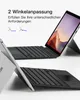 Two tablet-keyboard combinations are shown, one silver and one black, with a screen displaying a landscape image. Text overlays describe features. Produktbild-Vorschau