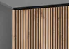 A close-up view of a piece of furniture, showing the texture and design of the wooden slats and the dark frame. Náhled obrázku produktu
