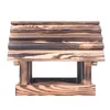 A wooden bird feeder on a white background. Podgląd zdjęcia produktu
