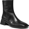 A black leather boot on a white background. Produktbild-Vorschau