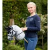 A young girl holding a hobby horse bridle in an outdoor setting. Náhľad obrázku produktu