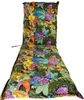 A colorful, tropical-patterned lounge chair cushion laid out flat against a white background. Produktbild-Vorschau