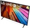 A television set with a colorful abstract background displayed on its screen, set against a white background with its stand visible. Produktbild-Vorschau