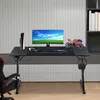 A gaming desk setup with a computer, gaming console, and accessories. Náhled obrázku produktu