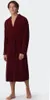 A man wearing a burgundy robe. Voir les images du produit
