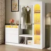 A well-lit entryway or hallway featuring a white storage unit with hanging clothes, a bench, and a glass-doored cabinet. Produktbild-Vorschau