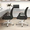 Two black office chairs are shown in a modern office setting. Produktbild-Vorschau