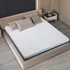 A mattress is shown on a bed frame in a bedroom setting. Produktbild-Vorschau