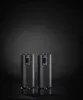 Two electric grinders on a dark surface with a dark background. Produktbild-Vorschau