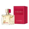 A bottle of Valentino Voce Viva Eau de Parfum and its red packaging are displayed against a white background. Voir les images du produit