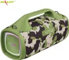 A camouflage-patterned portable Bluetooth speaker with a green handle and accents, set against a white background. Produktbild-Vorschau