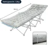 A gray padded mattress on a foldable cot frame, with dimensions and weight indicated. Podgląd zdjęcia produktu