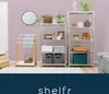 A bathroom or laundry room setting with shelving units, a towel rack, and decorative items. Náhled obrázku produktu